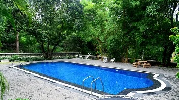 Luxury residential swimming pool at Shantai Bungalow Pune by Champion Pools